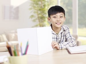 home portrait of a 10 year-old asian elementary schoolboy